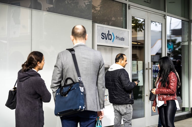 Customers outside a Silicon Valley Bank branch in Beverly Hills, Calif., on March 13, 2023.