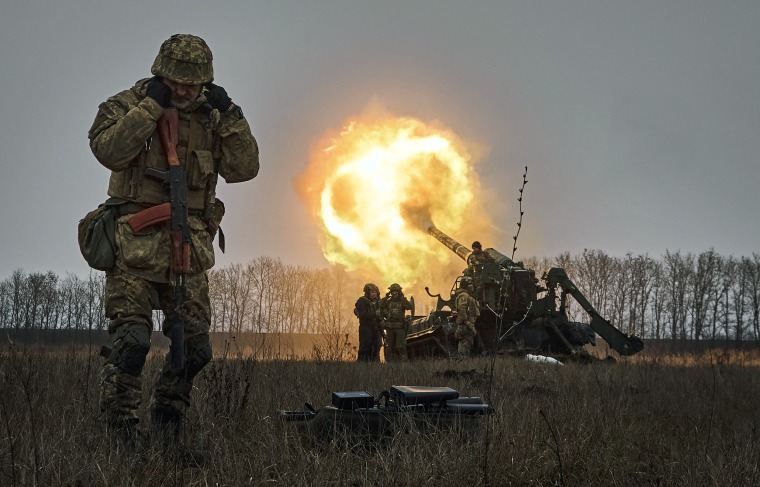 Ukrainian soldiers fire a Pion artillery system at Russian positions near Bakhmut, Ukraine