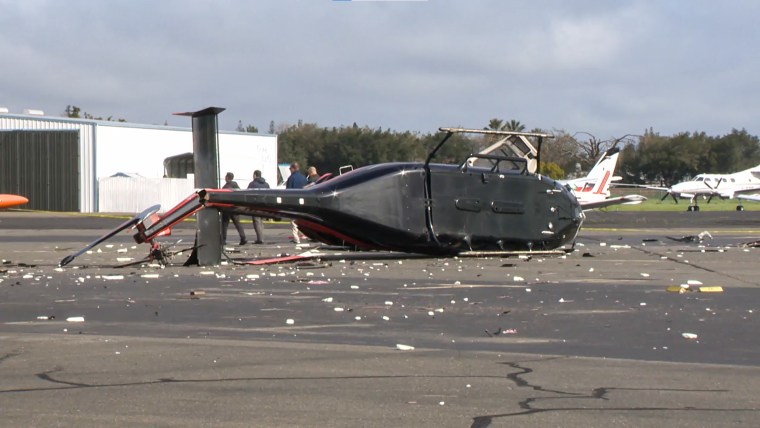 A crashed helicopter at Sacramento Executive Airport in Sacramento, Calif., on March 15, 2023.