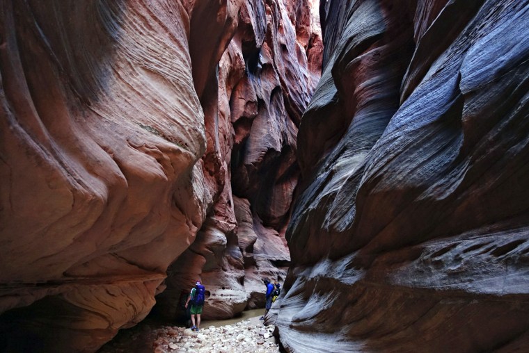 Sunlight peeks into the narrows of Buckskin Gulch in Kane County, Utah