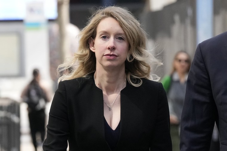 Former Theranos CEO Elizabeth Holmes leaves federal court in San Jose, Calif., Friday, March 17, 2023. 