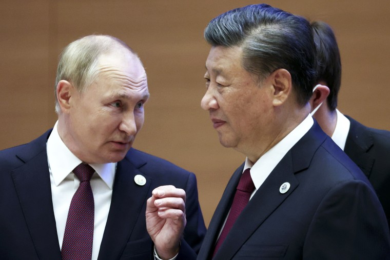 FILE - Russian President Vladimir Putin, left, gestures while speaking to Chinese President Xi Jinping during the Shanghai Cooperation Organization (SCO) summit in Samarkand, Uzbekistan, Sept. 16, 2022. China said Friday, March 17, 2023, President Xi will visit Russia from Monday, March 20, to Wednesday, March 22, 2023, in an apparent show of support for Russian President Putin amid sharpening east-west tensions over the conflict in Ukraine. (Sergei Bobylev, Sputnik, Kremlin Pool Photo via AP, File)