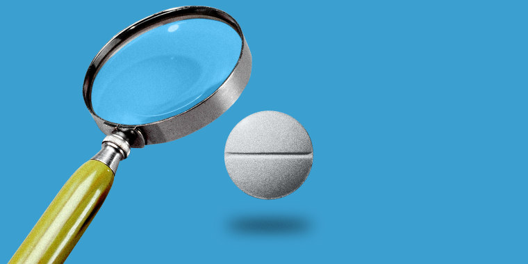 Photo illustration: A magnifying glass hovers over a misoprostol tablet.
