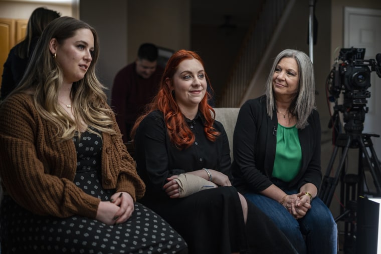 Virginia elementary school teacher Abigail Zwerner, center, her mother Julie, right, and sister Hannah, left, speak during an interview at an undisclosed location in Virginia on March 20, 2023. 