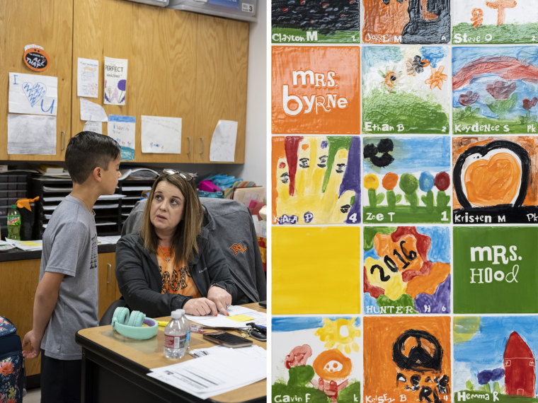 Art tiles created by students and teachers at Robert Lee ISD hang in the school’s elementary library in Robert Lee, Texas on March 9, 2023.