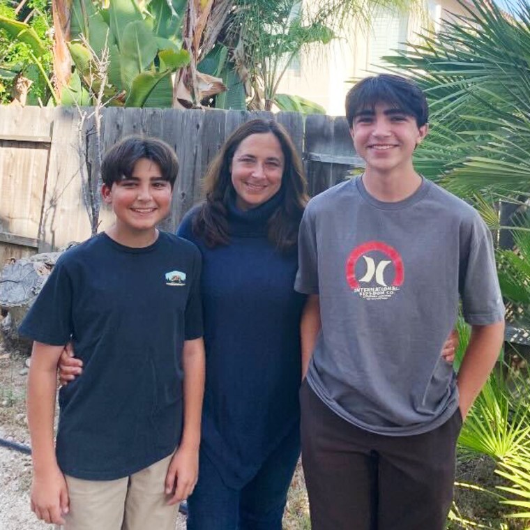 Annemarie Gibson with her sons, Owen, left, and Thomas.