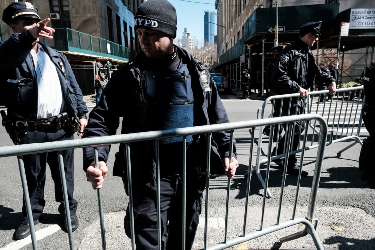 Police set up barricades outside of a courthouse in New York on March 21, 2023, ahead of a potential indictment of former President Donald Trump.