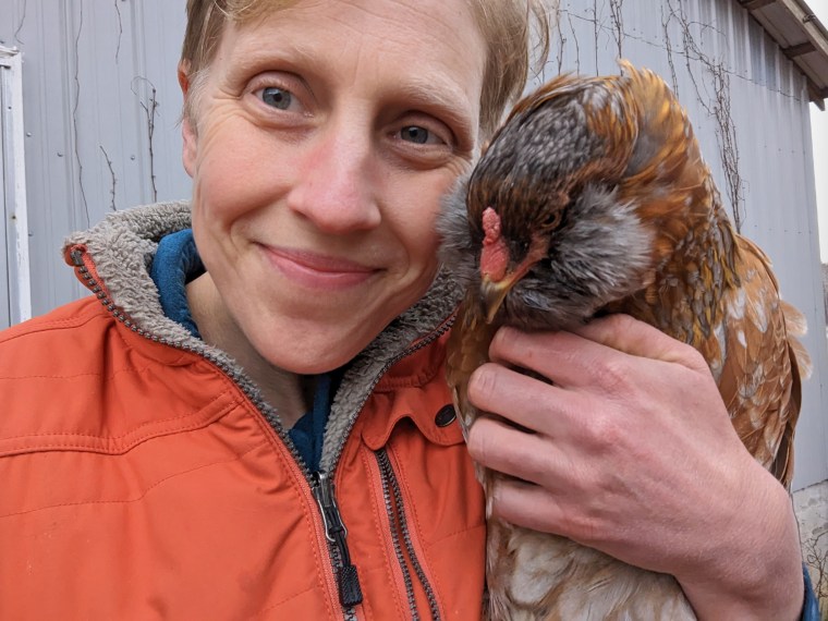 A.C. Shilton poses with "Chicki Minaj" on her farm in Tennessee.