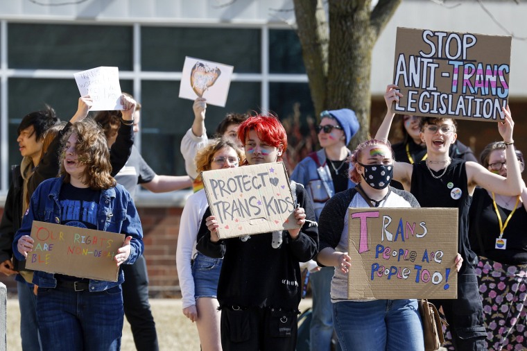 Bettendorf High School students walk out in support of Iowa's LGBTQ+ students in response to pending legislation on March 1, 2023, in Bettendorf, Iowa.