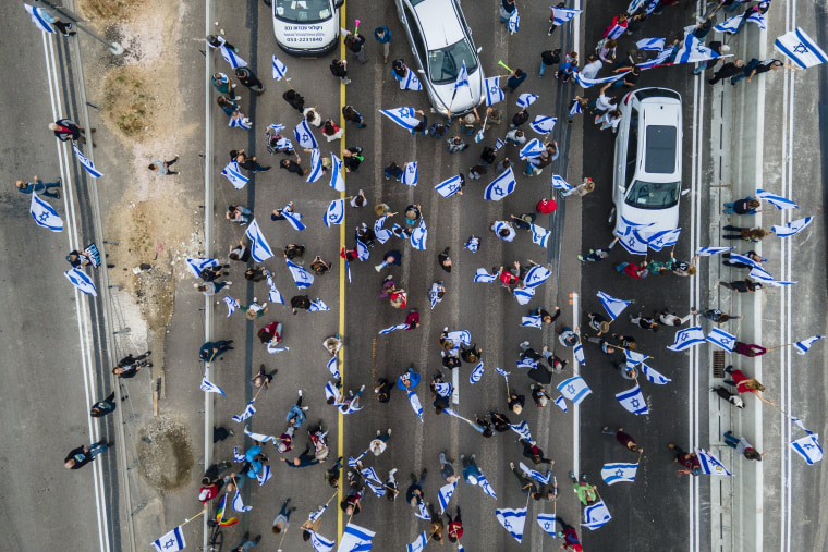 Israel’s parliament on Thursday passed the first of several laws that make up its contentious judicial overhaul as protesters opposing the changes staged another day of demonstrations aimed at ringing an alarm over what they see as the country’s descent toward autocracy.
