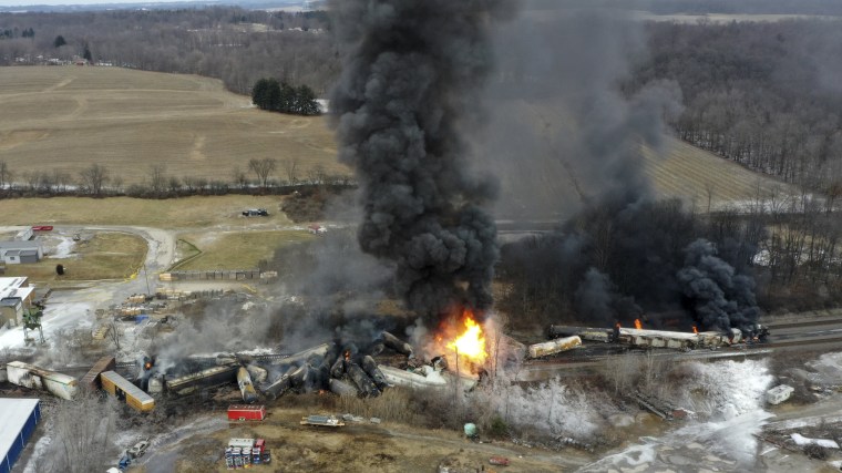 Portions of a Norfolk Southern freight train burns after a derailment in East Palestine, Ohio