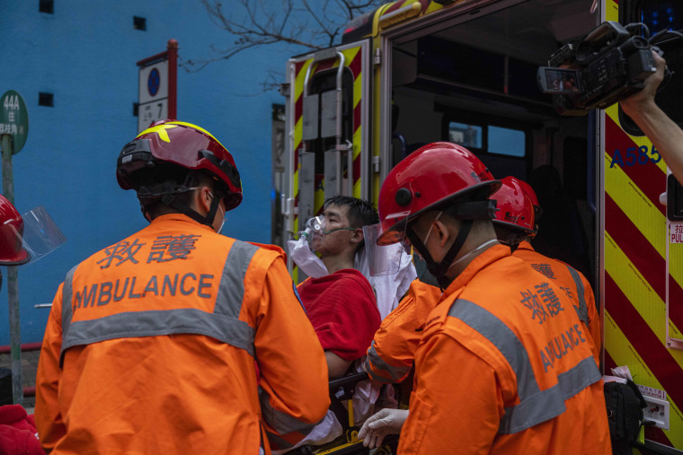 Hong Kong firefighters were battling a blaze Friday at a warehouse that forced more than 3,000 people to evacuate, including students, police said.