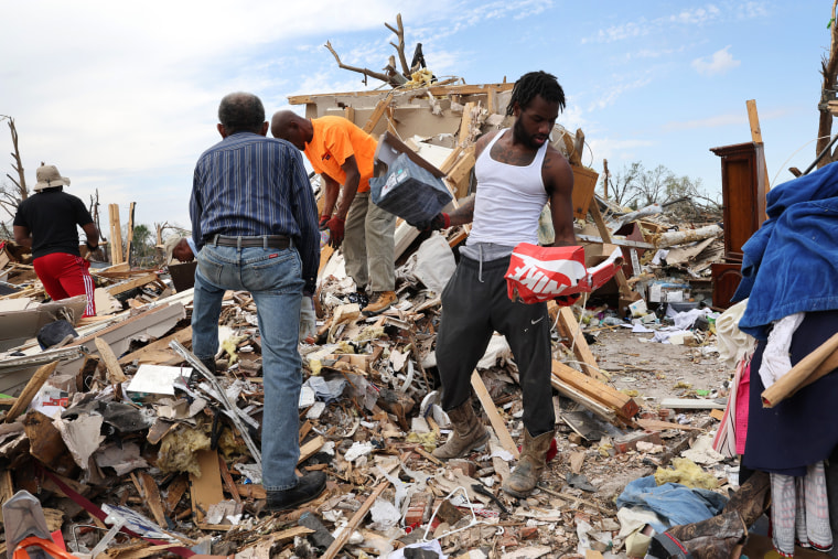 Residents continue to recover possessions from homes that were destroyed by a tornado in Rolling Fork, Miss.