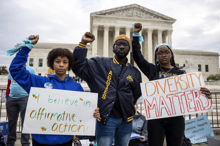 People rally in support of affirmative action outside the Supreme Court on Oct. 31, 2022.