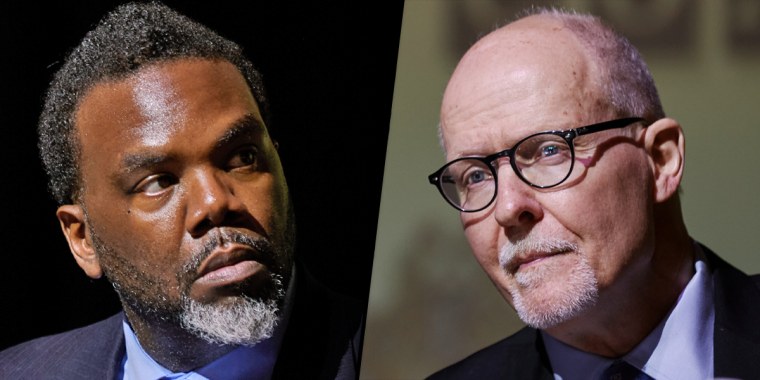 Brandon Johnson and Paul Vallas at a mayoral debate in Chicago on March 18, 2023. 