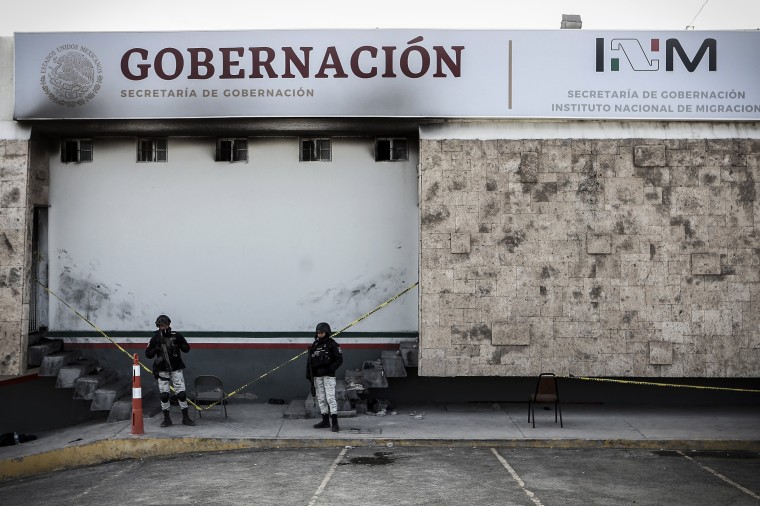 Image: Police stand guard outside a Mexican immigration detention center in Ciudad Juarez, Mexico, on March 28, 2023.