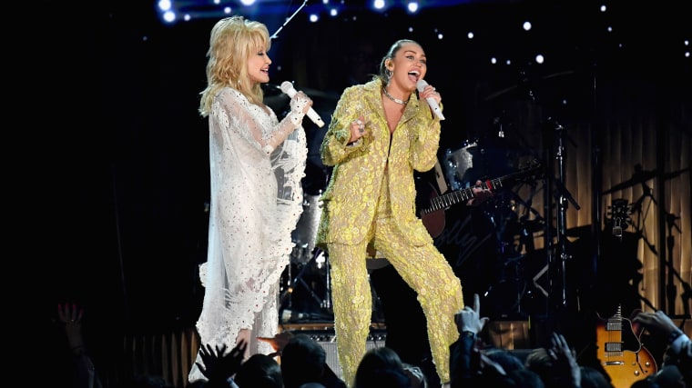 Dolly Parton, left, and Miley Cyrus perform during the 61st Annual GRAMMY Awards in Los Angeles