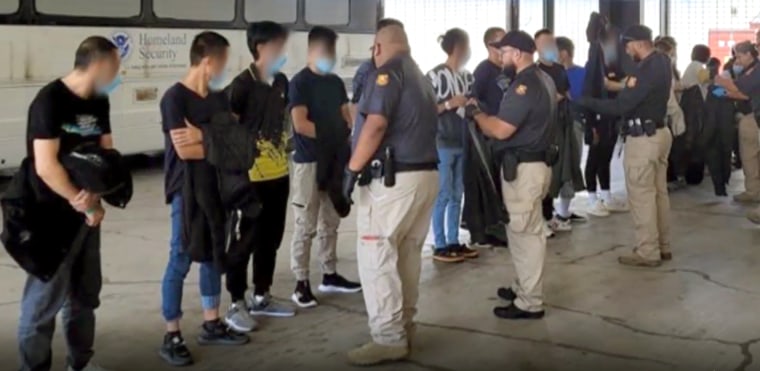 Chinese nationals detained at the U.S-Mexico border. 