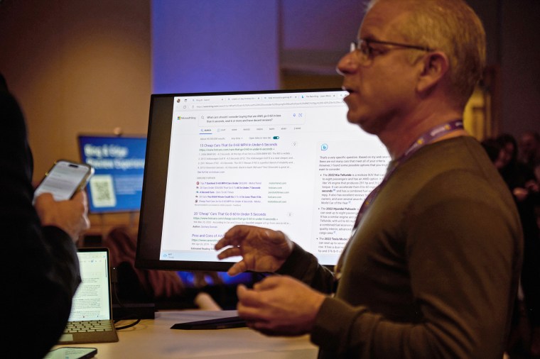 A worker gives a demonstration of the AI-powered Microsoft Bing search engine and Edge browser in Redmond, Wash.