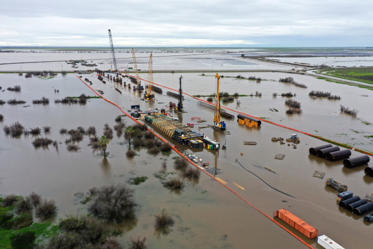 Construction equipment for California High Speed Rail project surrounded by flooding in Tulare County near Allensworth, Calif.