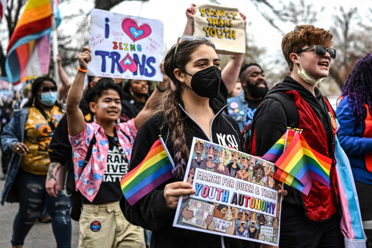 Image: Supporters of LGBTQ+ rights march from Union Station towards Capitol Hill on March 31, 2023.