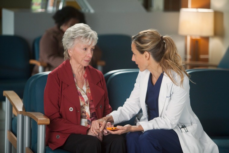 Teddy Altman (Kim Raver) consoles a patient. 