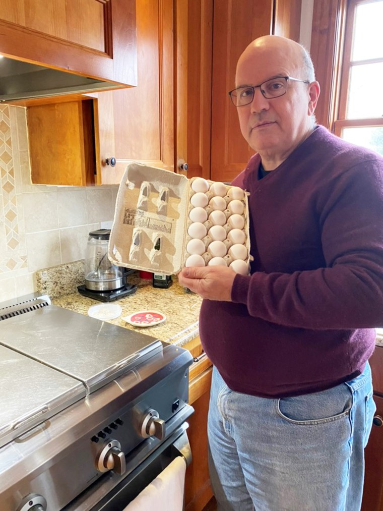 My dad, Richard, and his beloved eggs, which he uses almost exclusively for omelets.