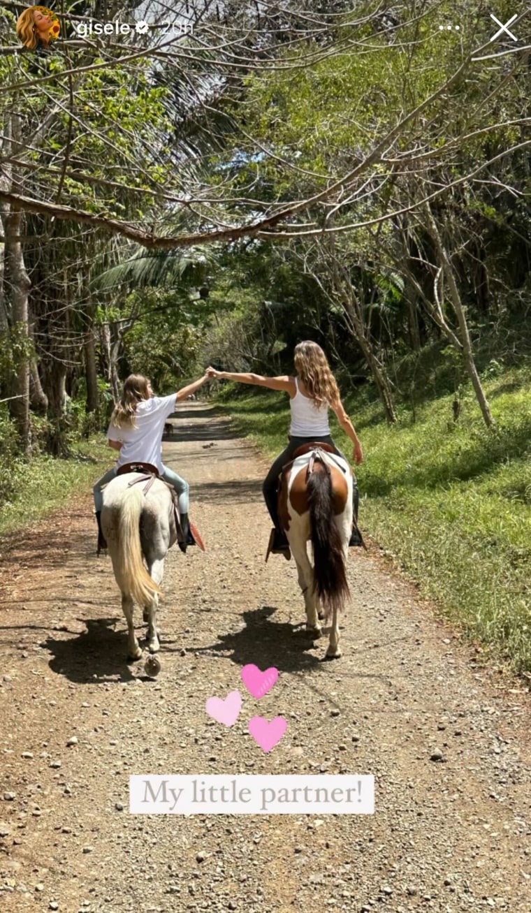 Gisele having some fun with daughter Vivian.