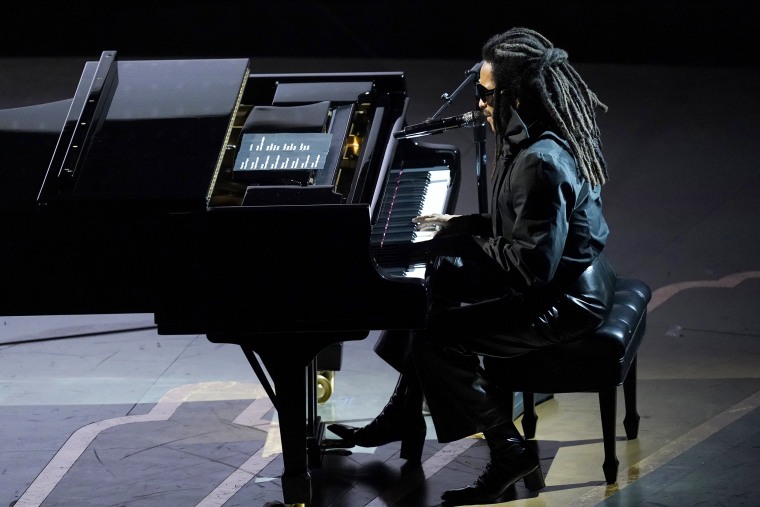 Lenny Kravtiz performs during an In memoriam tribute at the Oscars on March 12, 2023 in Los Angeles, CA.