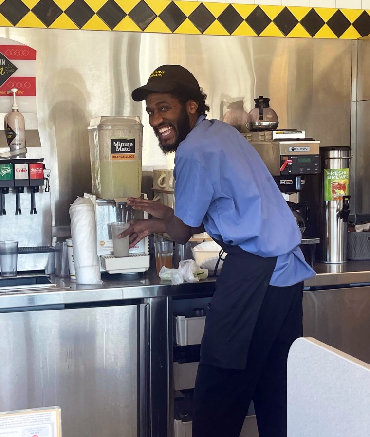 Gardner pouring a lemonade at Waffle House.