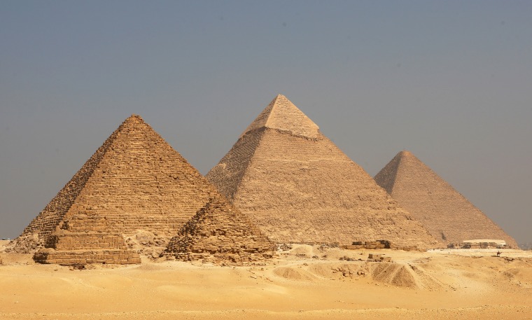 A view of the Pyramids at the Giza Plateau. From left to right is the Pyramid of Menkaure, the Pyramid of Khafre and the Great Pyramid at Giza in Cairo, Egypt. 