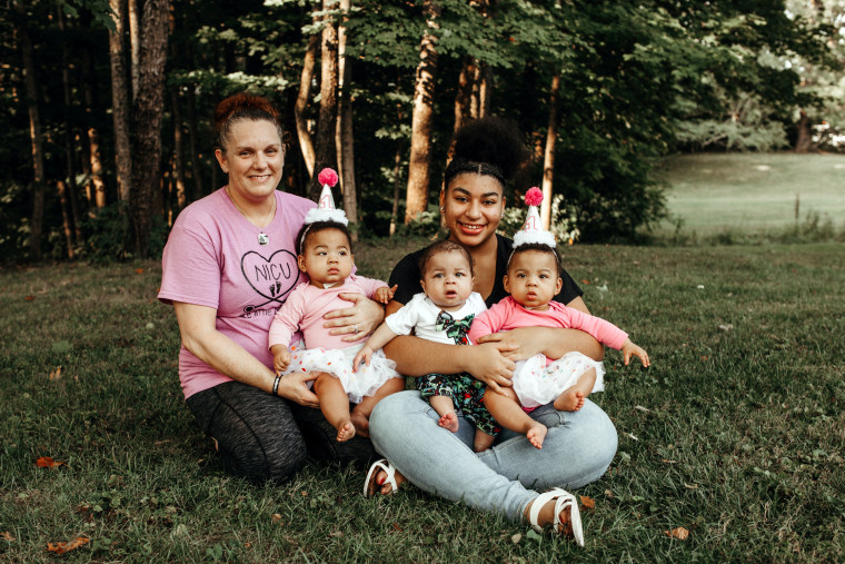 Katrina Mullen with Shariya Small and the triplets,  Serenitee, Samari, and Sarayah. The nurse knew the teen mom just needed 'a safe place to put roots.'