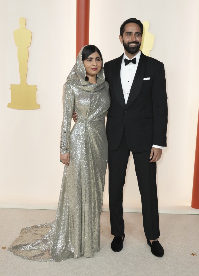 Malala Yousafzai, left, and Asser Malik 
