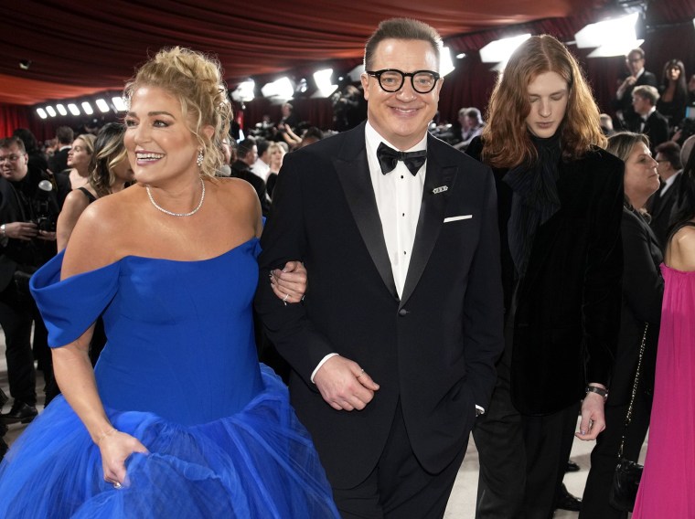 Jeanne Moore, Brendan Fraser, and Leland Francis Fraser arrive at the Oscars in Los Angeles.