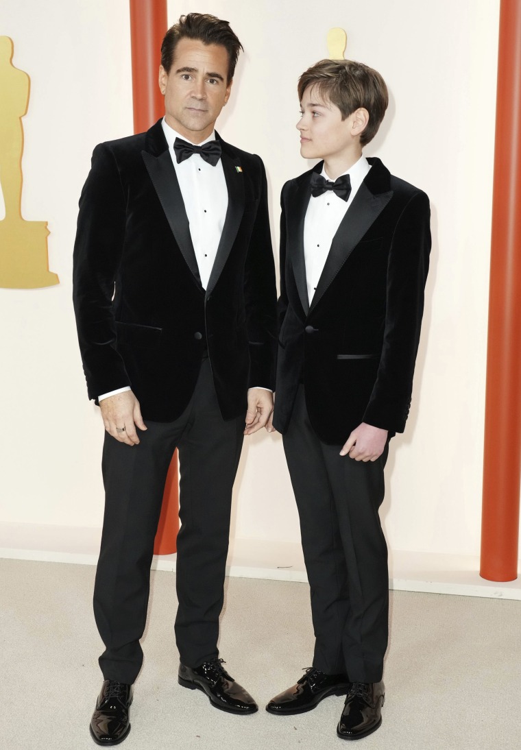 Colin Farrell and Henry Tadeusz Farrell arrive at the Oscars on  March 12, 2023 in Los Angeles.