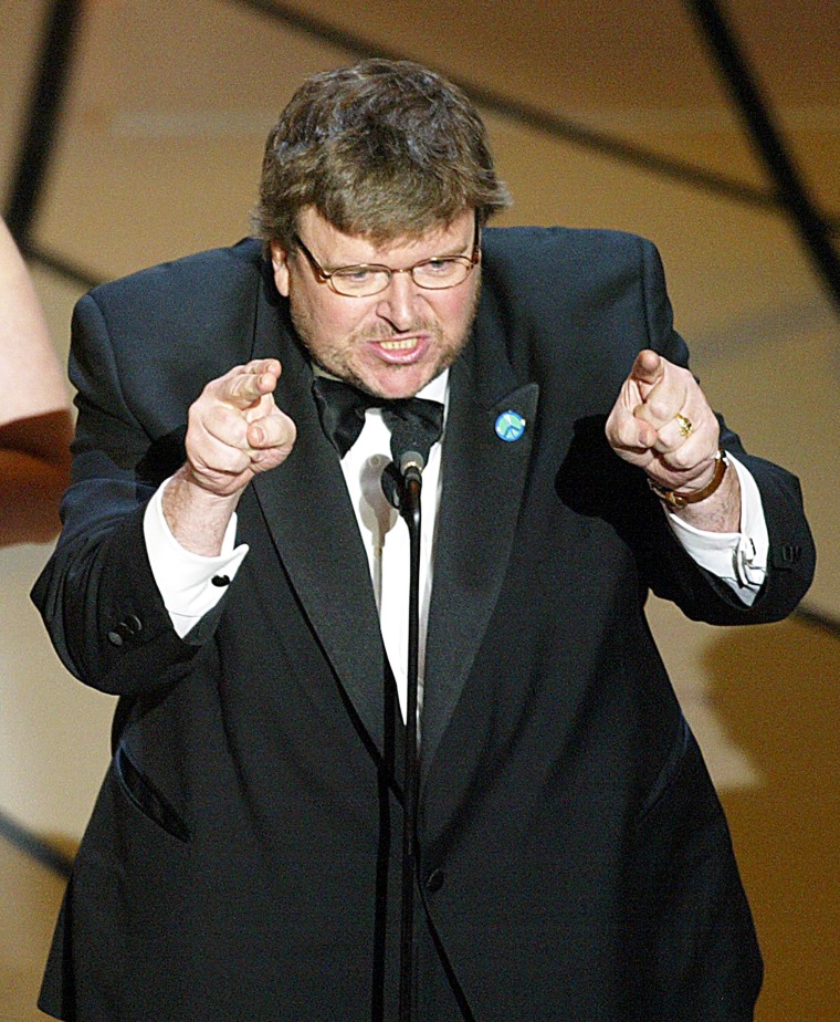 Michael Moore accepts his Oscar for Documentary Feature for "Bowling for Columbine" at the 75th Academy Awards.