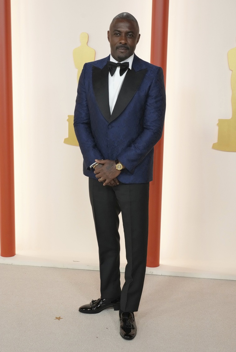 Idris Elba arrives at the Oscars on March 12, 2023 in Los Angeles.