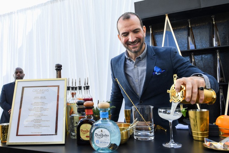 Charles Joly prepares a cocktail at the preview of the 'Governors Ball', the celebration immediately following the Oscars at The Ray Dolby Ballroom in Hollywood, California, on March 7, 2023. - The 95th Academy Awards will be held at the Dolby Theater on March 12, 2023.