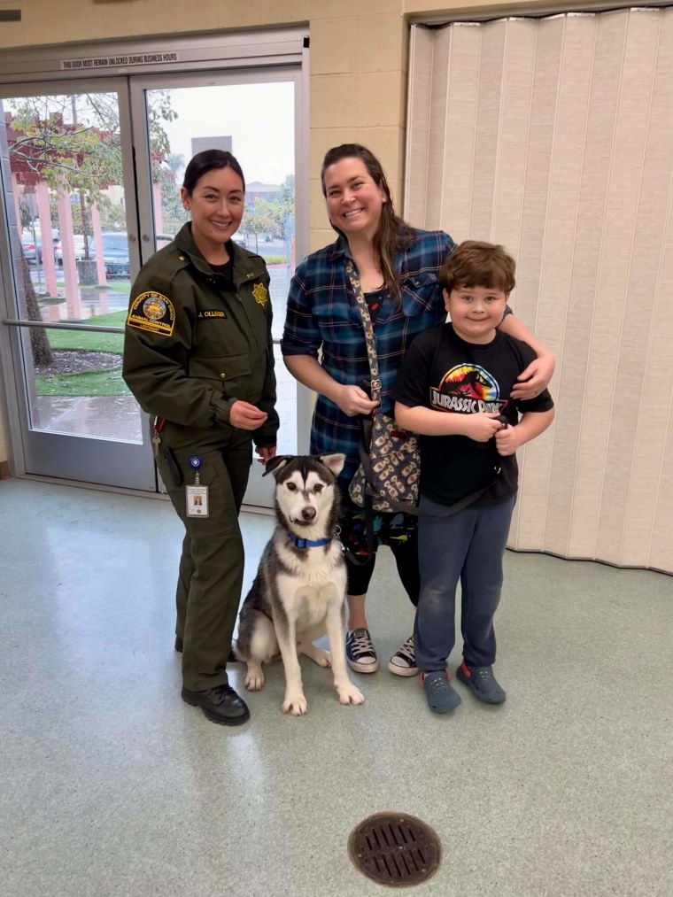 Ollinger, Lankston, her older son Harrison and Harvey pose for a photo at the shelter.