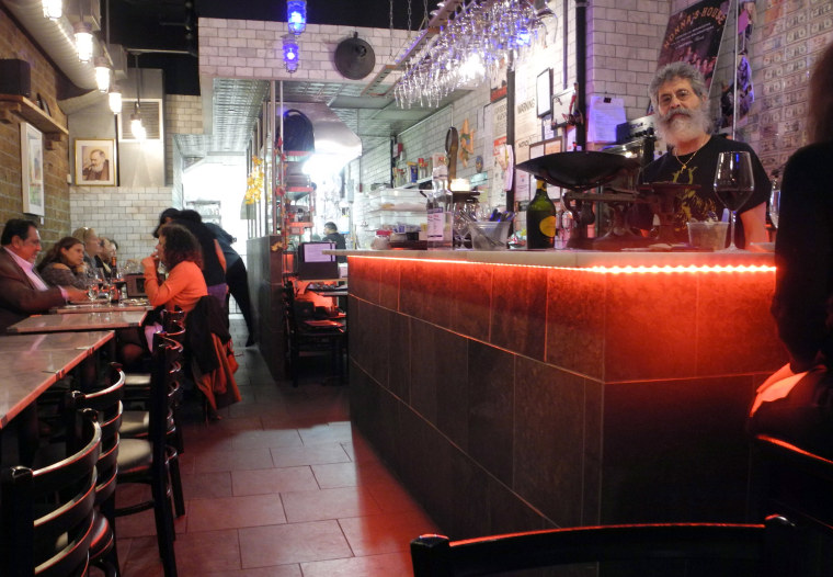 Joe Scaravella seen behind the counter of his restaurant 'Enoteca Maria' where grandmothers (Nonnas) make food on Staten Island, New York.