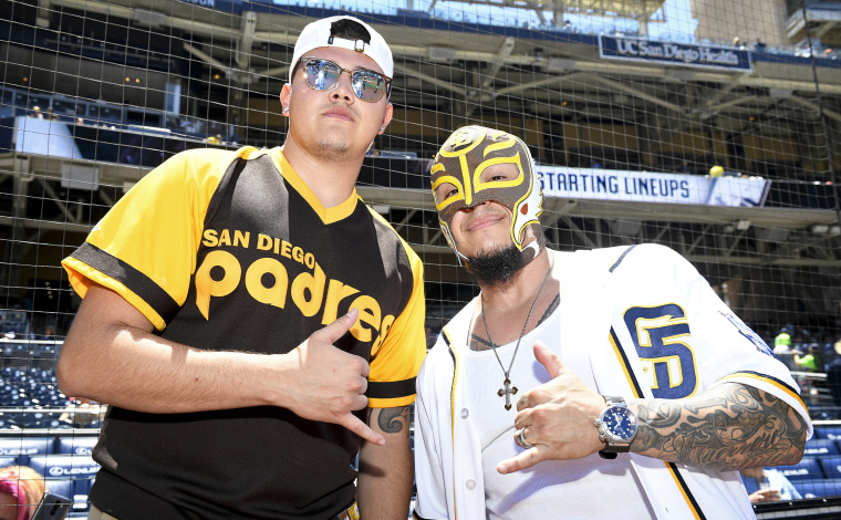 Rey Mysterio and son Dominik Gutierrez at a game between the San Diego Padres and the Washington Nationals on June 19, 2016 in San Diego, CA.