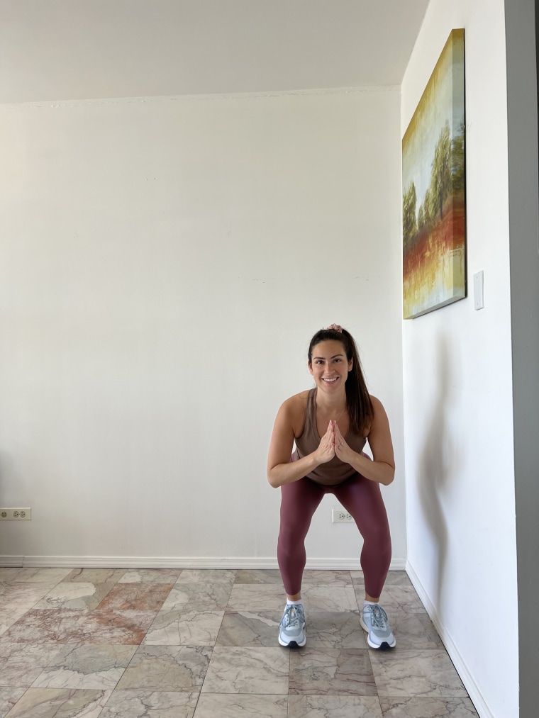 A woman doing a tabata workout 