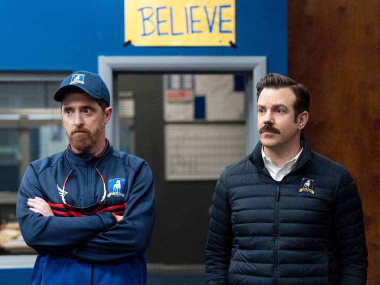 Brendan Hunt as Coach Beard and Jason Sudeikis as Ted Lasso.