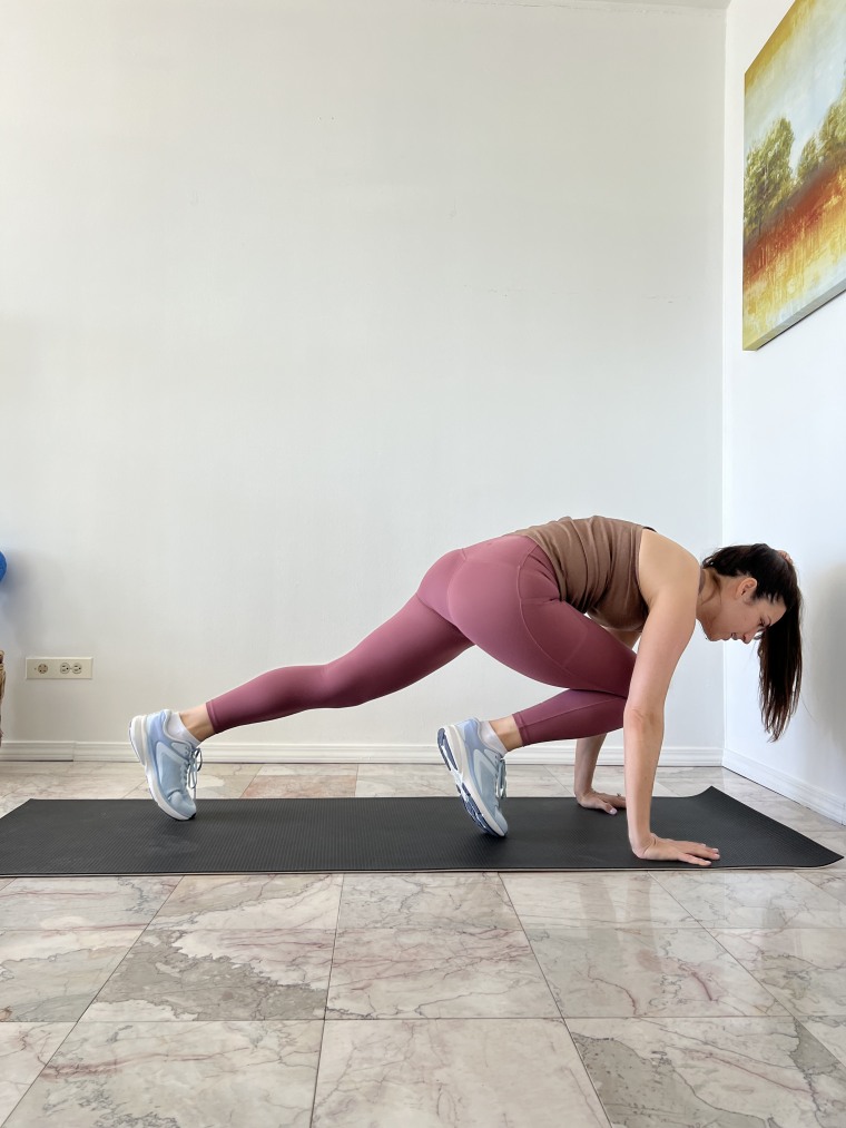 A woman doing a tabata workout 