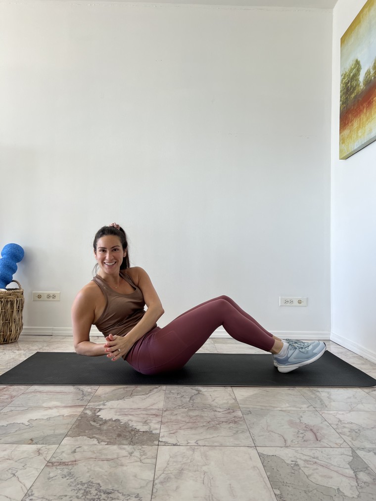 A woman doing a tabata workout 