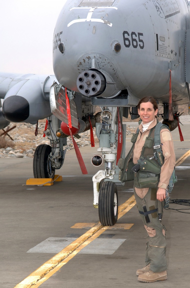Lt. Col. Martha McSally stands with her A-10 Thunderbolt II aircraft. The colonel is the first female pilot in the Air Force to fly in combat and to serve as a squadron commander of a combat aviation squadron.