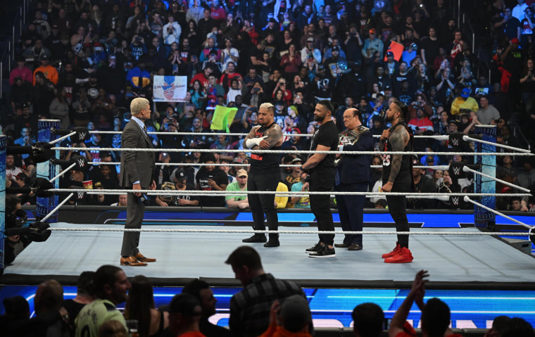 Cody Rhodes stares down Roman Reigns and the Bloodline