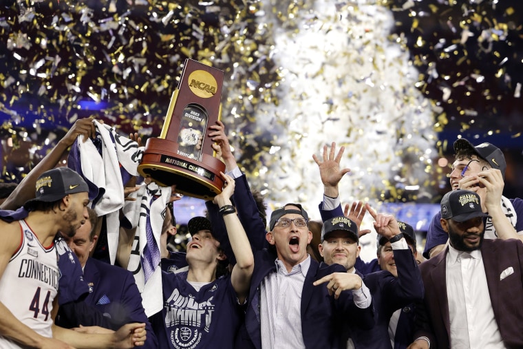 HOUSTON, TEXAS - APRIL 03: Head coach Dan Hurley of the Connecticut Huskies celebrates with his team after defeating the San Diego State Aztecs 76-59 during the NCAA Men's Basketball Tournament National Championship game at NRG Stadium on April 03, 2023 in Houston, Texas.