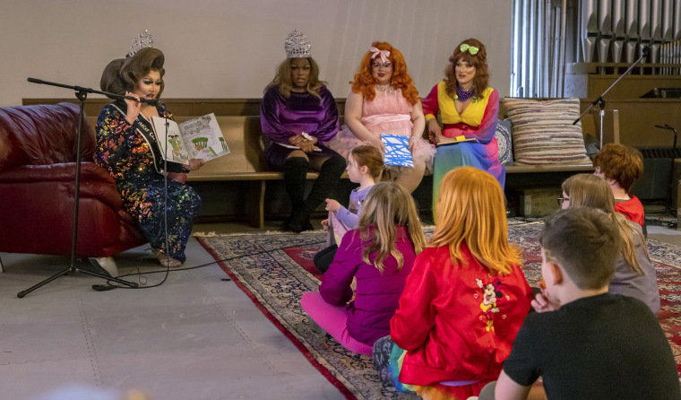 A Drag performer reads from a children's book at The Community Church of Chesterland's Drag Queen Story Hour
