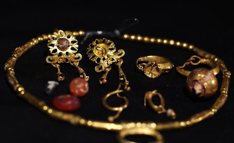 Gold jewelry discovered in the coffin of a young girl, buried in Jerusalem during the Roman period. The items were designed to protect the wearer in the afterlife.